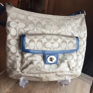 Light brown with navy accent Coach bag
